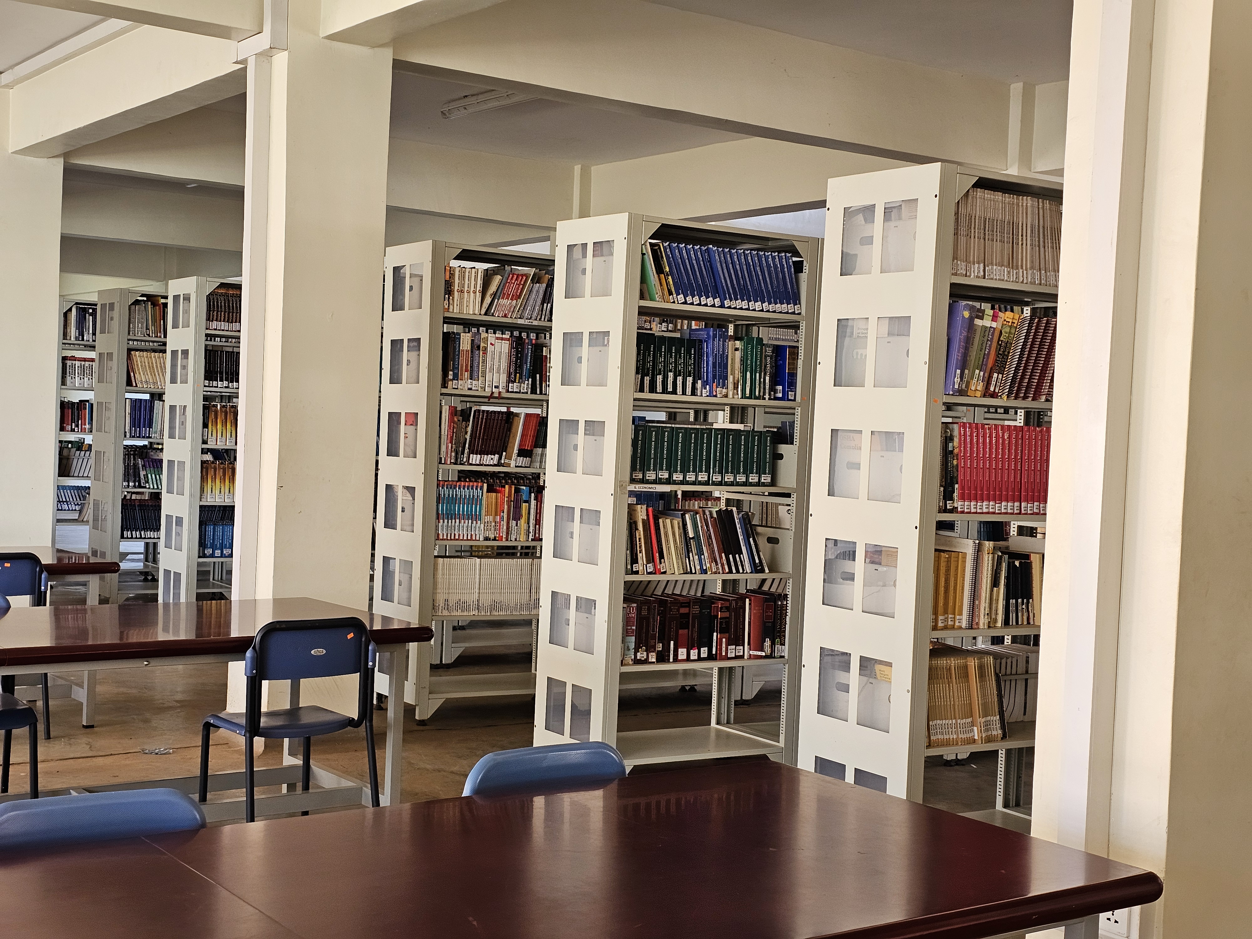 A view of the Busitema University Library, showing well-organized book shelves and reading spaces for students.